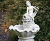BOY RIDING DOLPHIN FOUNTAIN